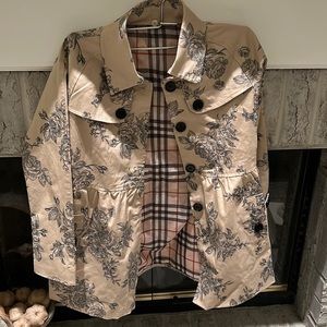 Cute boutique Trenchcoat for your little one. Great for fall/spring, pics etc